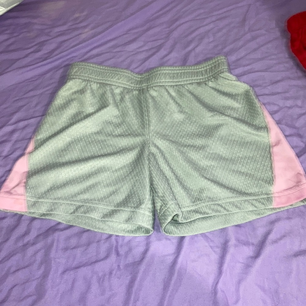 Green and pink basketball shorts